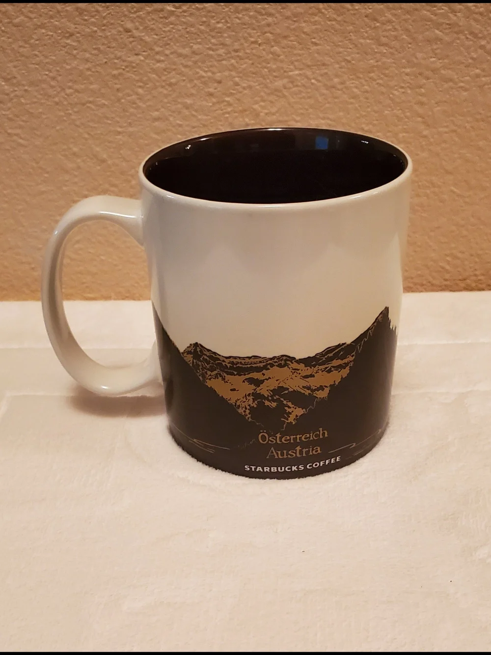 Starbucks Austria Souvenir Mug in Cream & Brown with Tan Hat Artwork